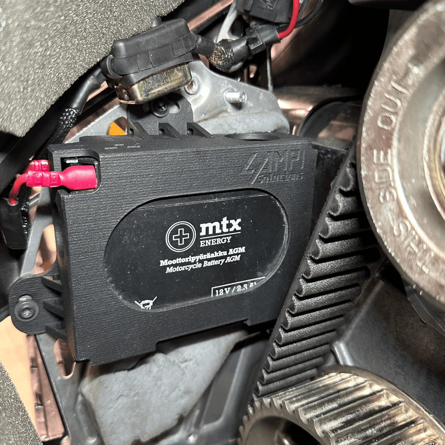 Akkukotelo Polaris Matryx, Hihnaveto